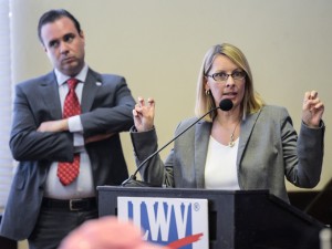 Dr. Jessica Spencer, who helps run Vote No on 2, right, debates with Ben Pollara, campaign manager for United For Care, left, during a medical marijuana debate held by the League of Women Voters of Manatee County on Monday.  (Staff photo by Dan Wagner)