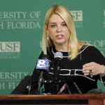 Florida Attorney General Pam Bondi gestures during a news conference Thursday, Aug. 7, 2014, at the University of South Florida in Tampa. (Associated Press) 