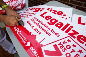 Campaign posters for D.C. Ballot Initiative 71, which won on Nov. 4,  setting the stage for recreational marijuana in the nation's capital.  (AP Photo/Jacquelyn Martin) 