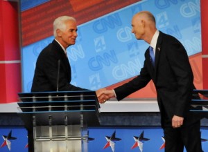 Florida Democratic gubernatorial candidate Charlie Crist, left, shakes hands with Gov. Rick Scott their Oct. 21 debate in Jacksonville. (AP Photo/The Florida Times-Union)  