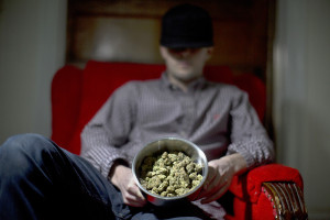 A Washington D.C. marijuana dealer shows some of his wares. Business has been booming since legalization.  (Photo for The Washington Post by Evelyn Hockstein) 
