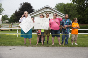Protesters outside the First Church of Cannabis during its first service in Indianapolis, July 1, 2015. The church was created with the thinking that if Indiana’s new law protected religious practices, then it should also permit marijuana use as part of a broader spiritual philosophy. (Aaron P. Bernstein/The New York Times)