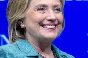 Hillary Clinton, former U.S. secretary of state and 2016 Democratic presidential candidate, smiles at the beginning of a discussion after speaking at the Brookings Institution in Washington, D.C., U.S., on Wednesday, Sept. 9, 2015. Clinton's speech is an attempt to offer reassurance to skeptics of the Iran nuclear agreement, including some congressional Democrats and many in the Jewish community who worry that the deal will not diminish the threat that Iran poses to Israel. Photographer: Andrew Harrer/Bloomberg *** Local Caption *** Hillary Clinton